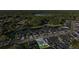 Aerial view of the property and neighborhood featuring a tranquil lake view at 6035 Nikki Ln, Odessa, FL 33556
