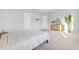 Spacious bedroom features neutral tones, stylish decor, and comfortable space with plenty of light at 6035 Nikki Ln, Odessa, FL 33556