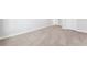 Neutral carpeting and baseboards create a clean, blank canvas at 6035 Nikki Ln, Odessa, FL 33556