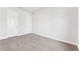 Spacious bedroom with neutral carpet and large closet doors at 6035 Nikki Ln, Odessa, FL 33556