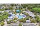 Aerial view of the community pool, amenities and surrounding greenery at 6041 Sandhill Ridge Dr, Lithia, FL 33547