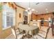 Cozy dining area with decorative walls, chandelier, and ample natural light at 6041 Sandhill Ridge Dr, Lithia, FL 33547