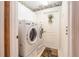 Functional laundry room equipped with modern washer and dryer units at 6041 Sandhill Ridge Dr, Lithia, FL 33547