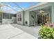 Outdoor patio with a screened enclosure, overhead ceiling fan and seating at 6041 Sandhill Ridge Dr, Lithia, FL 33547