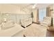 Stylish Bedroom with a white crib, accent wall, and neutral decor at 630 Timber Bay W Cir, Oldsmar, FL 34677