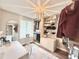 Spacious closet area with clothing racks, shelving, and desk at 630 Timber Bay W Cir, Oldsmar, FL 34677