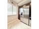 Bright kitchen with stainless steel refrigerator, tile floors, and window at 630 Timber Bay W Cir, Oldsmar, FL 34677