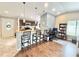 Inviting kitchen and dining area with granite countertops and barstool seating at 630 Timber Bay W Cir, Oldsmar, FL 34677