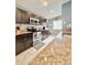 Modern kitchen featuring stainless steel appliances and granite countertops at 630 Timber Bay W Cir, Oldsmar, FL 34677