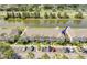 Beautiful townhome complex with lush landscaping and convenient parking, close to a serene canal at 637 Kensington Lake Cir, Brandon, FL 33511