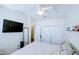 Bright main bedroom with ceiling fan, large closet, and ample natural light at 637 Kensington Lake Cir, Brandon, FL 33511