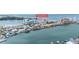 Aerial view of the coastline in Clearwater Beach near the water with yachts docked in front of condos and businesses at 706 Bayway Blvd # 503, Clearwater, FL 33767