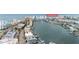Aerial view of the coastline in Clearwater Beach near the water with yachts docked in front of condos and businesses at 706 Bayway Blvd # 503, Clearwater, FL 33767