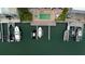 Aerial view of a condo complex with docks, boat slips and a pool at 706 Bayway Blvd # 503, Clearwater, FL 33767