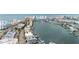Aerial view of the coastline in Clearwater Beach near the water with yachts docked in front of condos and businesses at 706 Bayway Blvd # 503, Clearwater, FL 33767