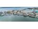 Aerial view of the coastline in Clearwater Beach near the water with yachts docked in front of condos and businesses at 706 Bayway Blvd # 503, Clearwater, FL 33767