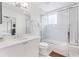 Bathroom with a vanity and shower/tub featuring modern fixtures at 706 Bayway Blvd # 503, Clearwater, FL 33767