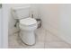 White toilet with tiled floor at 706 Bayway Blvd # 503, Clearwater, FL 33767