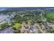 An aerial view of a tree lined neighborhood, offering a blend of homes and community amenities at 711 42Nd S Ave, St Petersburg, FL 33705