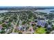 An aerial view showing neighborhood with lush trees, local schools and recreational spaces at 711 42Nd S Ave, St Petersburg, FL 33705