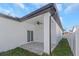 Covered back patio with tile flooring and a ceiling fan at 711 42Nd S Ave, St Petersburg, FL 33705