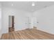 Bedroom featuring hardwood floors, recessed lighting, and access to bathroom and closet at 711 42Nd S Ave, St Petersburg, FL 33705