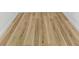 Close-up of newly installed light-colored hardwood flooring at 711 42Nd S Ave, St Petersburg, FL 33705