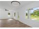The living room is bright and spacious with hardwood floors and natural light at 711 42Nd S Ave, St Petersburg, FL 33705