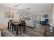 Comfortable living and dining area with modern decor and lots of natural light at 7433 Greystone Dr # 7433, Hudson, FL 34667