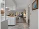 Bright, open-concept living space with seamless flow from kitchen to living room at 7433 Greystone Dr # 7433, Hudson, FL 34667