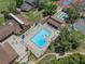 Aerial view of the community pool and lounging area for residents to enjoy at 7433 Greystone Dr # 7433, Hudson, FL 34667