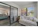 Bright sunroom featuring a sliding glass door and large windows to enjoy the outdoors at 7433 Greystone Dr # 7433, Hudson, FL 34667
