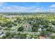 Aerial view of a home with a water view in the distance at 774 40Th Ne Ave, St Petersburg, FL 33703
