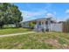 Charming single-story home with a well-manicured lawn and inviting walkway at 774 40Th Ne Ave, St Petersburg, FL 33703