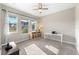 Bright bedroom filled with natural light, featuring neutral walls, carpet flooring, and modern furnishings at 8840 Mugnai St, Riverview, FL 33578