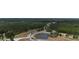 Scenic aerial shot showcases lush landscaping, serene ponds, and winding neighborhood roads at 8922 Little Bluestem Dr, Land O Lakes, FL 34637