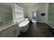 Luxury bathroom with a soaking tub, double vanities, and a glass-enclosed shower at 8922 Little Bluestem Dr, Land O Lakes, FL 34637