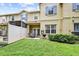 Cozy backyard patio with a grill and dining set, perfect for outdoor entertaining at 9206 River Rock Ln, Riverview, FL 33578