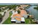 Scenic aerial view of waterfront townhomes featuring private boat docks and access to the bay at 4304 Harbor House Dr, Tampa, FL 33615
