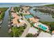 Community aerial view featuring waterfront homes with private docks and a well-maintained neighborhood at 4304 Harbor House Dr, Tampa, FL 33615
