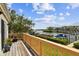 Balcony with wooden railing overlooking the boat docks and waterways at 4304 Harbor House Dr, Tampa, FL 33615