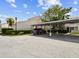 Assigned carport with landscaping and unit numbers, providing covered parking at 4304 Harbor House Dr, Tampa, FL 33615