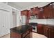 Modern kitchen featuring stainless steel appliances and custom cabinetry at 10101 Paddock Oaks Dr, Riverview, FL 33569