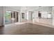 Open-plan living space with seamless flow to the kitchen and outdoor area at 10101 Paddock Oaks Dr, Riverview, FL 33569