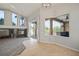 Spacious living room with large windows and view of the pool area at 10101 Paddock Oaks Dr, Riverview, FL 33569