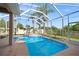 Relaxing screened-in pool area with a hot tub and plenty of space for outdoor lounging and entertaining at 10101 Paddock Oaks Dr, Riverview, FL 33569