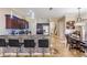 Inviting kitchen with granite countertops, stainless steel appliances, and breakfast bar seating at 1031 Andrew Aviles Cir, Tampa, FL 33619