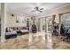 Open-concept living space featuring stylish furniture and slider access to the backyard at 1031 Andrew Aviles Cir, Tampa, FL 33619