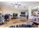 Inviting living room showcasing an open layout with view of the kitchen and backyard access at 1031 Andrew Aviles Cir, Tampa, FL 33619