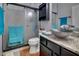 Contemporary bathroom with sleek finishes, a glass-enclosed shower, a unique vessel sink, and modern fixtures at 10327 Meadow Crossing Dr, Tampa, FL 33647